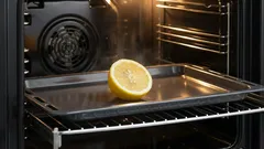 Why should you put half a lemon in the oven, and what is the actual purpose of doing so?